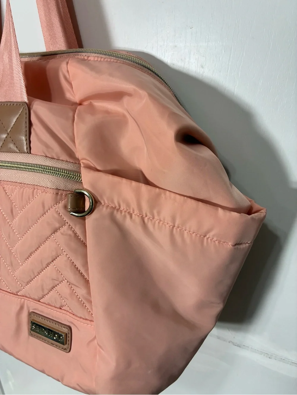 Skip Hop Suite 6-In-1 Diaper Bag in blush pink with quilted details. EUC